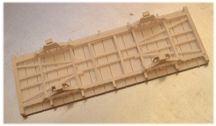 Wydruk z drukarki 3W podwozia wagonu kolejowego, którego model narysowałem w programie OpenSCAD